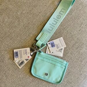 NWT- Lululemon Never Lost Keychain and True Identity Card Case